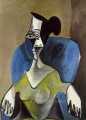Mujer sentada en un sillón azul 1962 Pablo Picasso